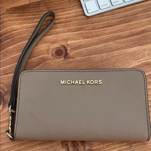 Michael Kors tan/brown wristlet